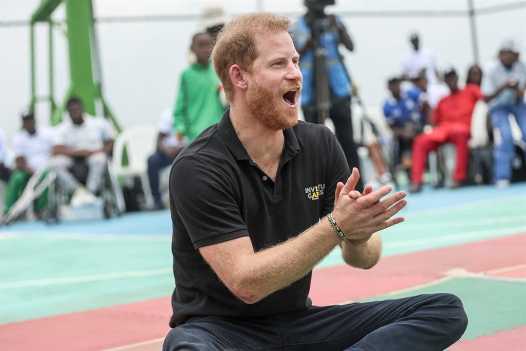Britain's Prince Harry, Duke of Sussex, applauds a