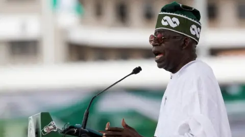 Reuters Nigeria's President Bola Tinubu speaks after his swearing-in ceremony in Abuja, Nigeria May 29, 2023