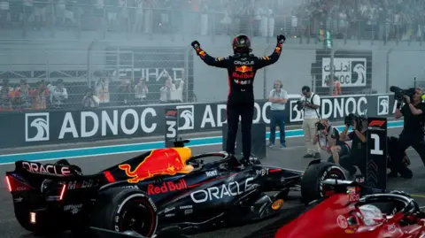 Getty Images Max Verstappen of Netherlands and Oracle Red Bull Racing celebrates during the F1 Grand Prix of Abu Dhabi at Yas Marina Circuit on November 26, 2023