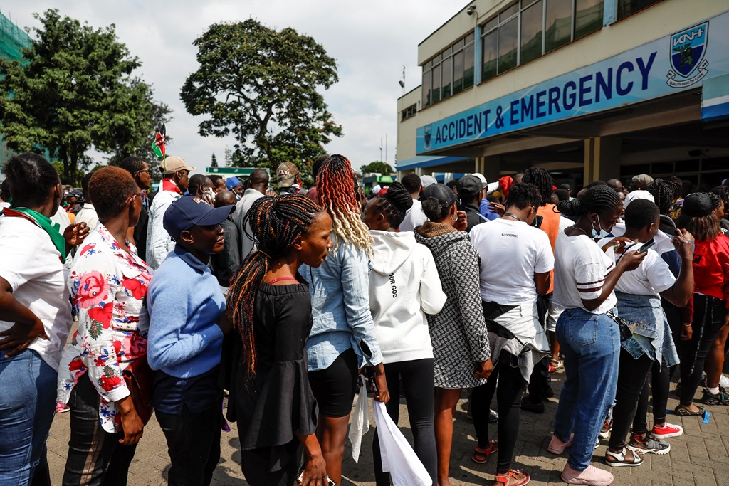 Kenyan youths arrive at the Kenyatta National Hosp