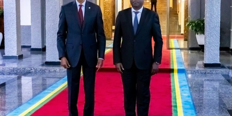 Rwandan President Paul Kagame (L) at the swearing-in ceremony of Prime Minister Édouard Ngirente (R) for a second term on Wednesday. (@PrimatureRwanda/X, formerly Twitter)