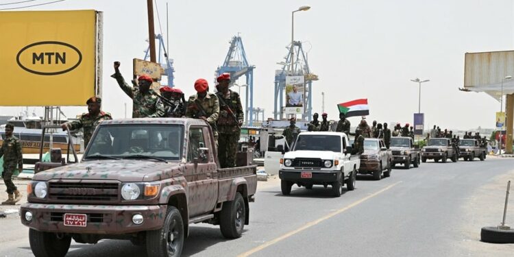 Members of Sudans armed forces take part in a military parade held on the occasion of Army Day in Port Sudan on 14 August 2024. (AFP)