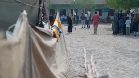 Kevin McGregor / BBC A camp in Port Sudan