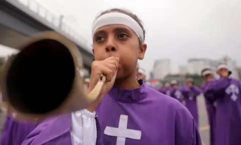  Tiksa Negeri / Reuters Ethiopian Orthodox choir member blows a traditional trumpet during the Meskel festival, a celebration to commemorate the discovery of the True Cross on which Jesus Christ was crucified, in Addis Ababa, Ethiopia, September 26, 2024