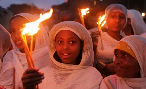  Tiksa Negeri / Reuters Ethiopian Orthodox faithful hold candles during the Meskel festival celebration to commemorate the discovery of the True Cross on which Jesus Christ was crucified, in Addis Ababa, Ethiopia, September 26, 2024