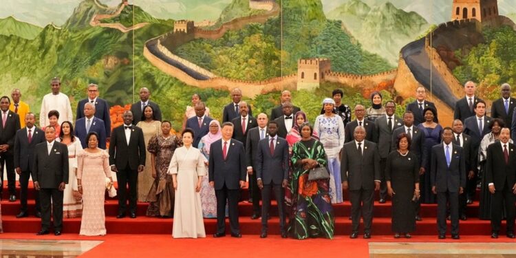 Chinas President Xi Jinping (front 4th L) and his wife Peng Liyuan (front 3rd L) pose for a group photograph with leaders from African nations ahead of a dinner reception during the Forum on China-Africa Cooperation (FOCAC) at the Great Hall of the People in Beijing on 4 September 2024. (Ken Ishii/ AFP)