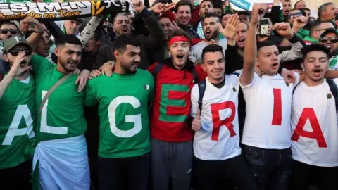 EPA Algerians during a protest in Algiers in 2019 against extending then-President Abdelaziz Bouteflika's mandate