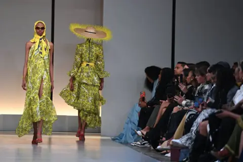 LEFTY SHIVAMBU /  GETTY IMAGES Models walk the catwalk on Saturday, wear Imprint by Mzukisi Mbane - Saturday 28 September 2024