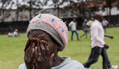 REUTERS A woman reacts after her family member died - Thursday 3 October 2024