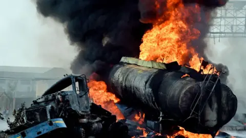 AFP A tanker laden with petrol goes up in flames after overturning on the Lagos-Ibadan expressway in Magboro, Ogun state, Nigeria - 2 December 2020