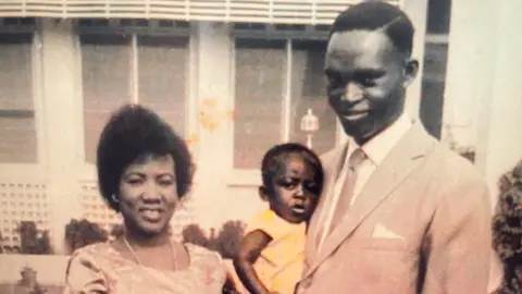 Mahamudu Bawumia An old photo of a young Mahamudu Bawumia with his mother and father