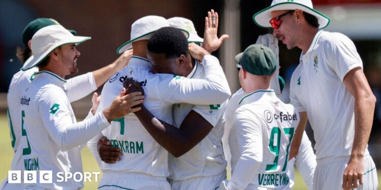 Kagiso Rabada celebrates with his South Africa team-mates after taking a wicket in the second Test against Sri Lanka in Gqeberha