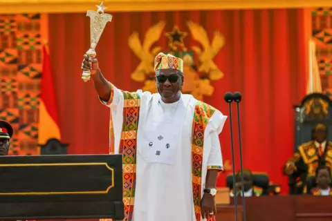 Nipah Dennis / AFP Ghana's new President John Mahama holds the state sword at his inauguration in the capital Accra - Tuesday 7 January 2025.