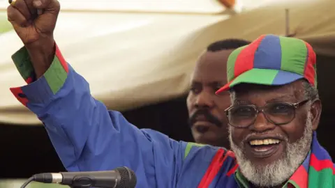 AFP Namibian President Sam Nujoma addresses a rally in Windhoek in Windhoek to support his handpicked successor candidate Hifikepunye Pohamba 13 November 2004.